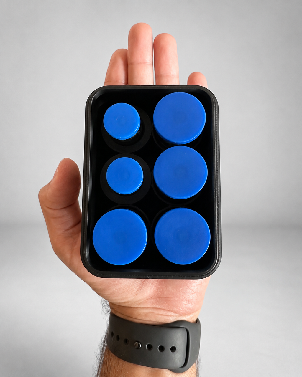 6-vial storage case shown from above in hand