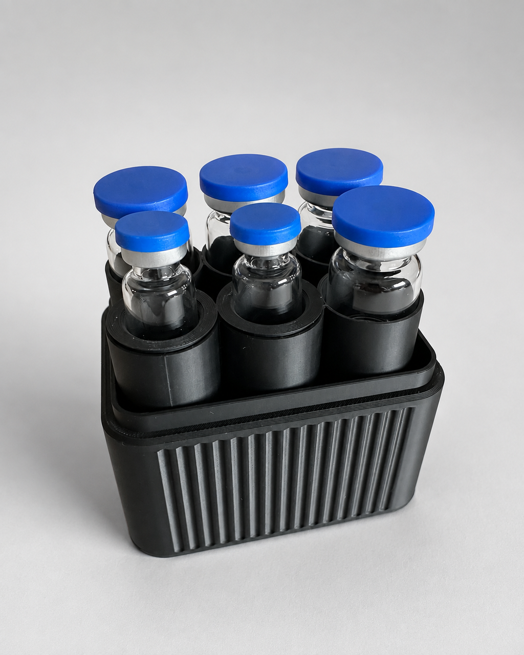 6-vial storage case open with six vials