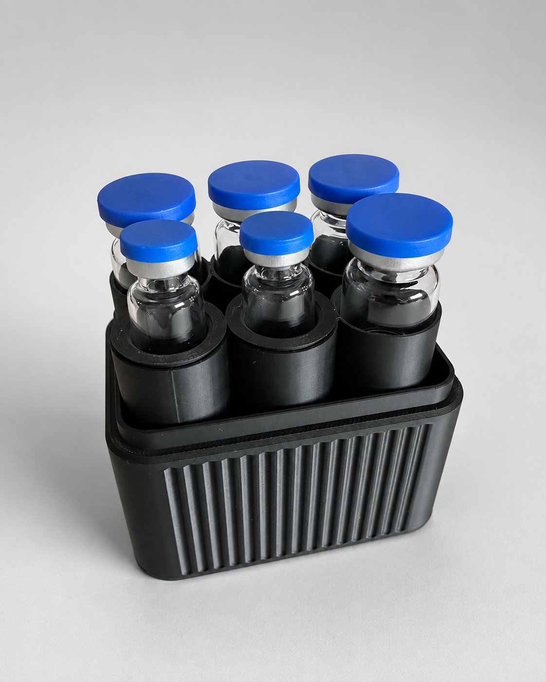 6-vial storage case open with six vials
