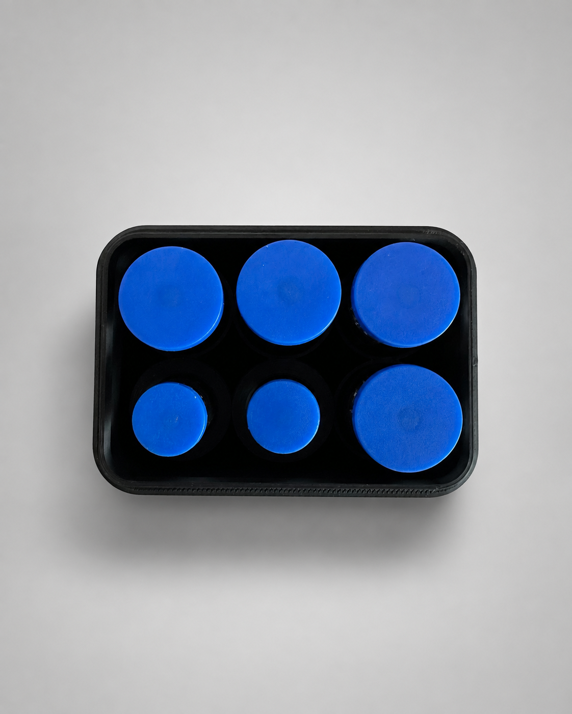 Top view of six vials in the storage case tray